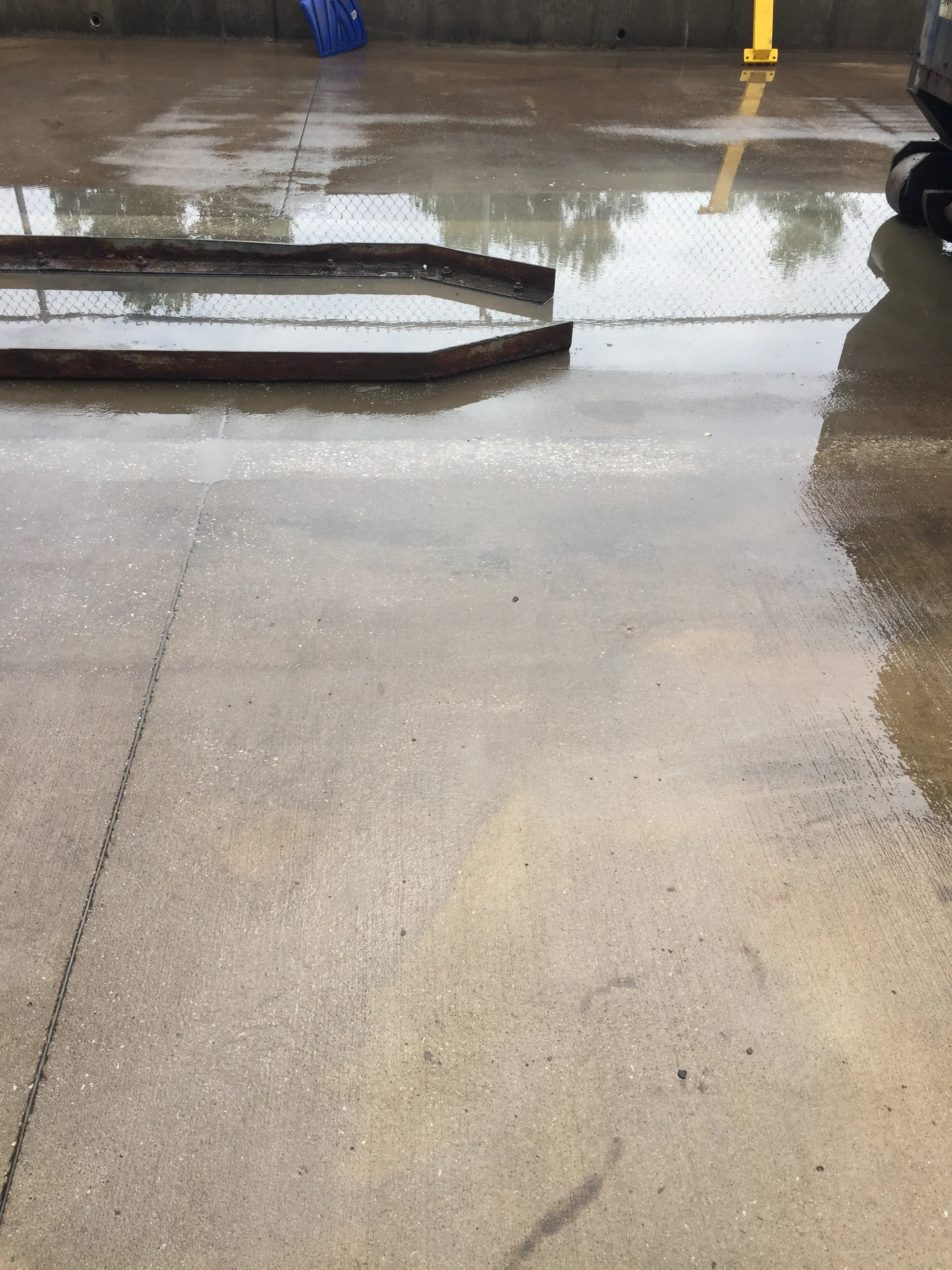Big Joe's pressure washing service - commercial concrete parking lot cleaned in Kansas City